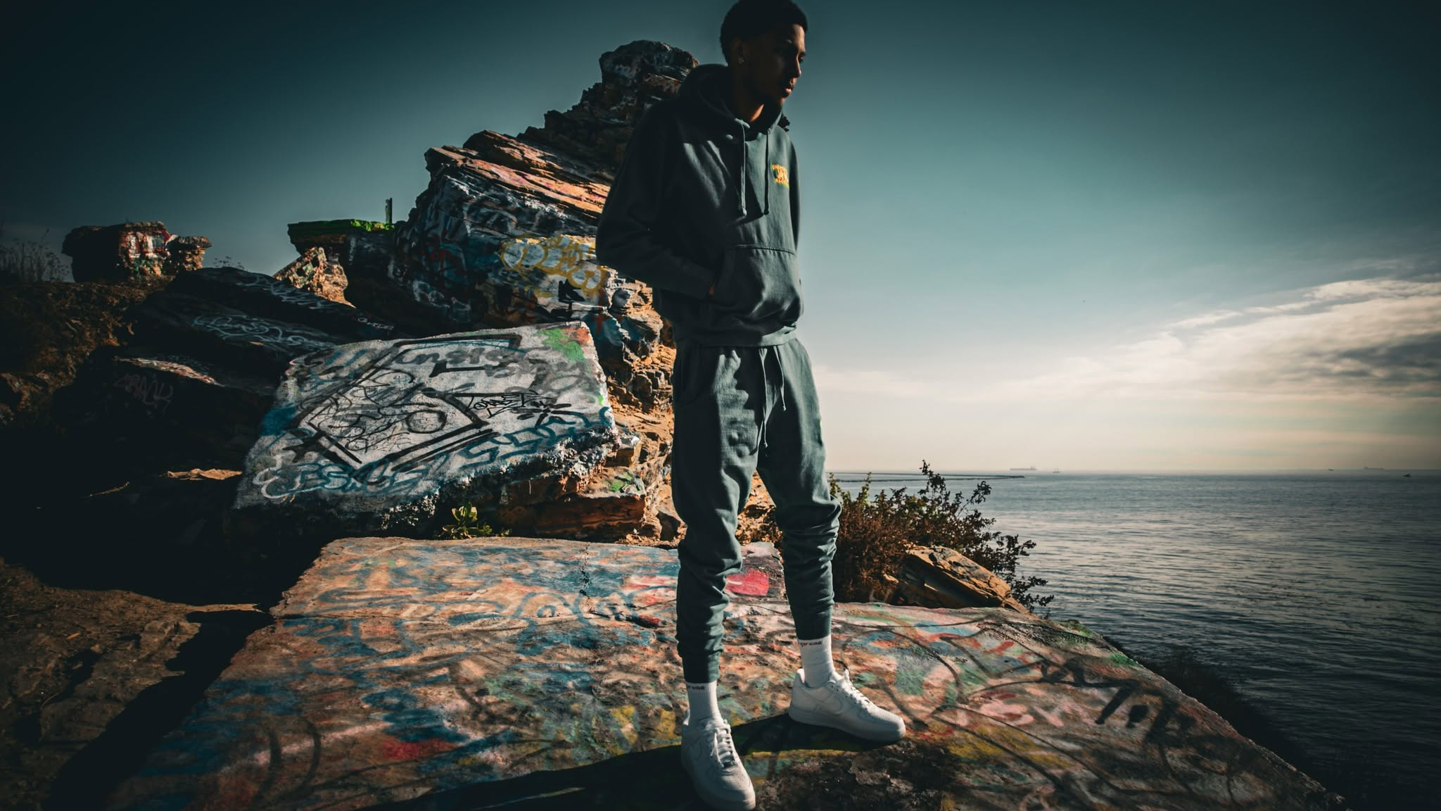 BailMoney lifestyle campaign wide portrait overlooking the ocean