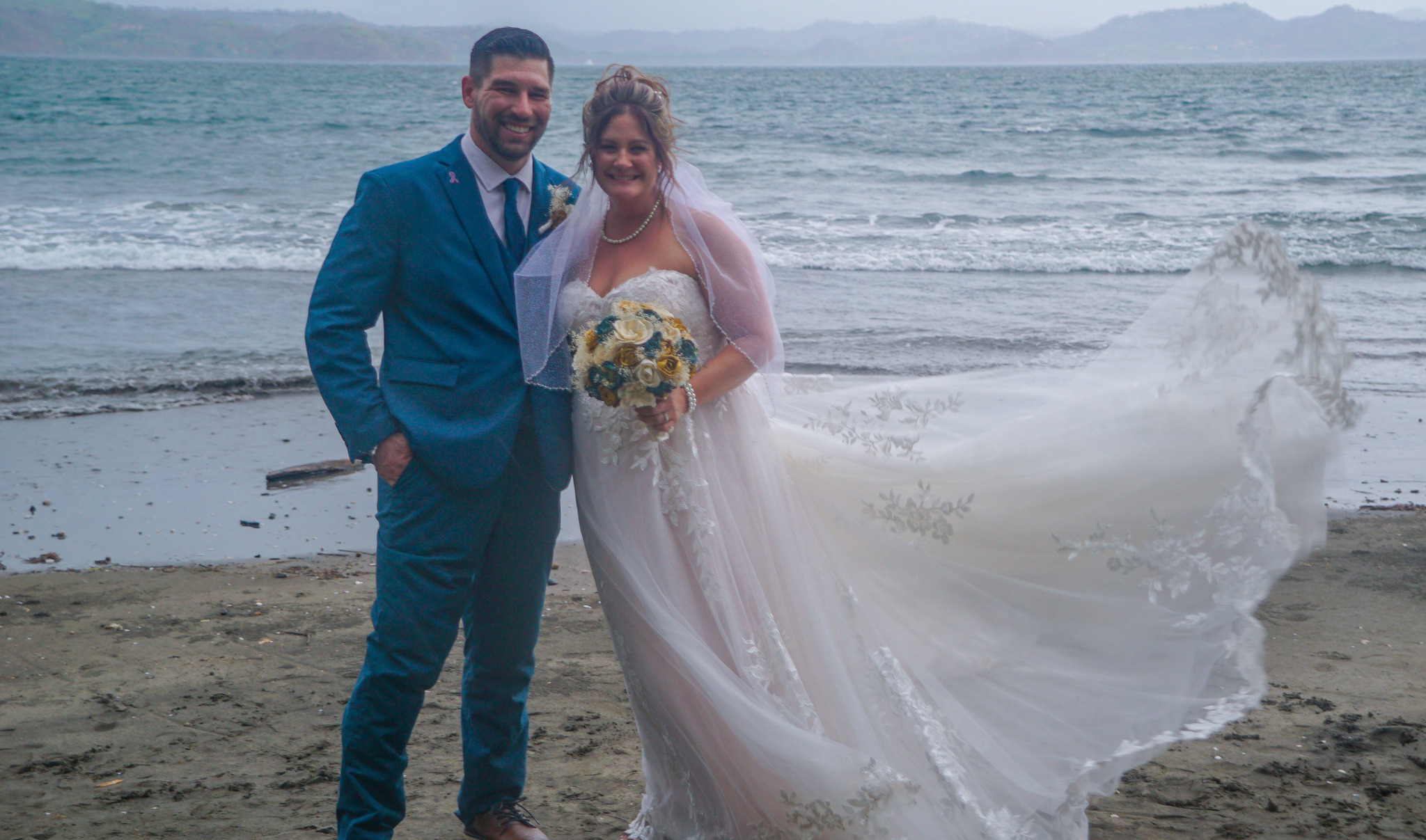 Brandi and Zack together beside the ocean