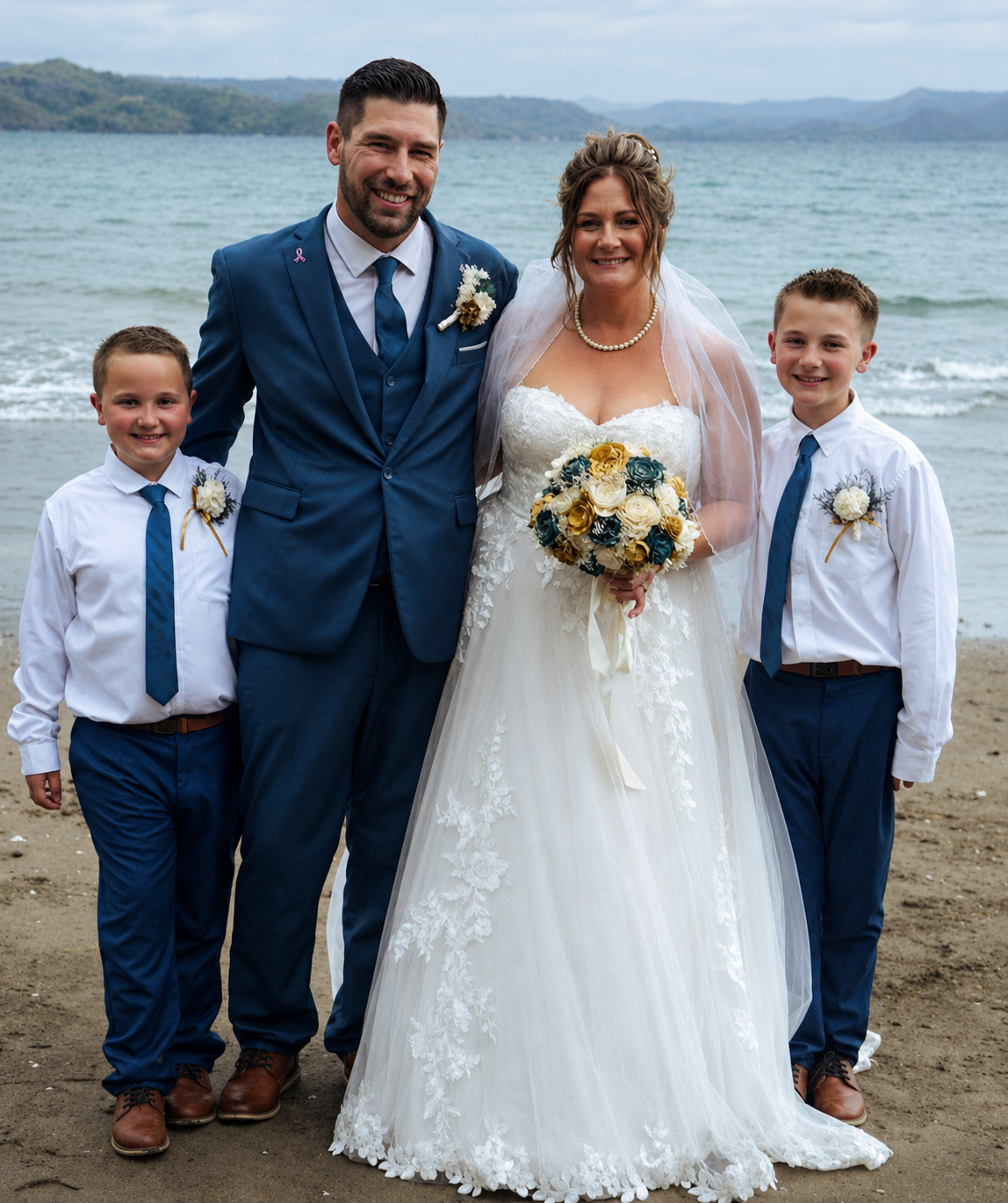 Brandi and Zack with their family on the beach