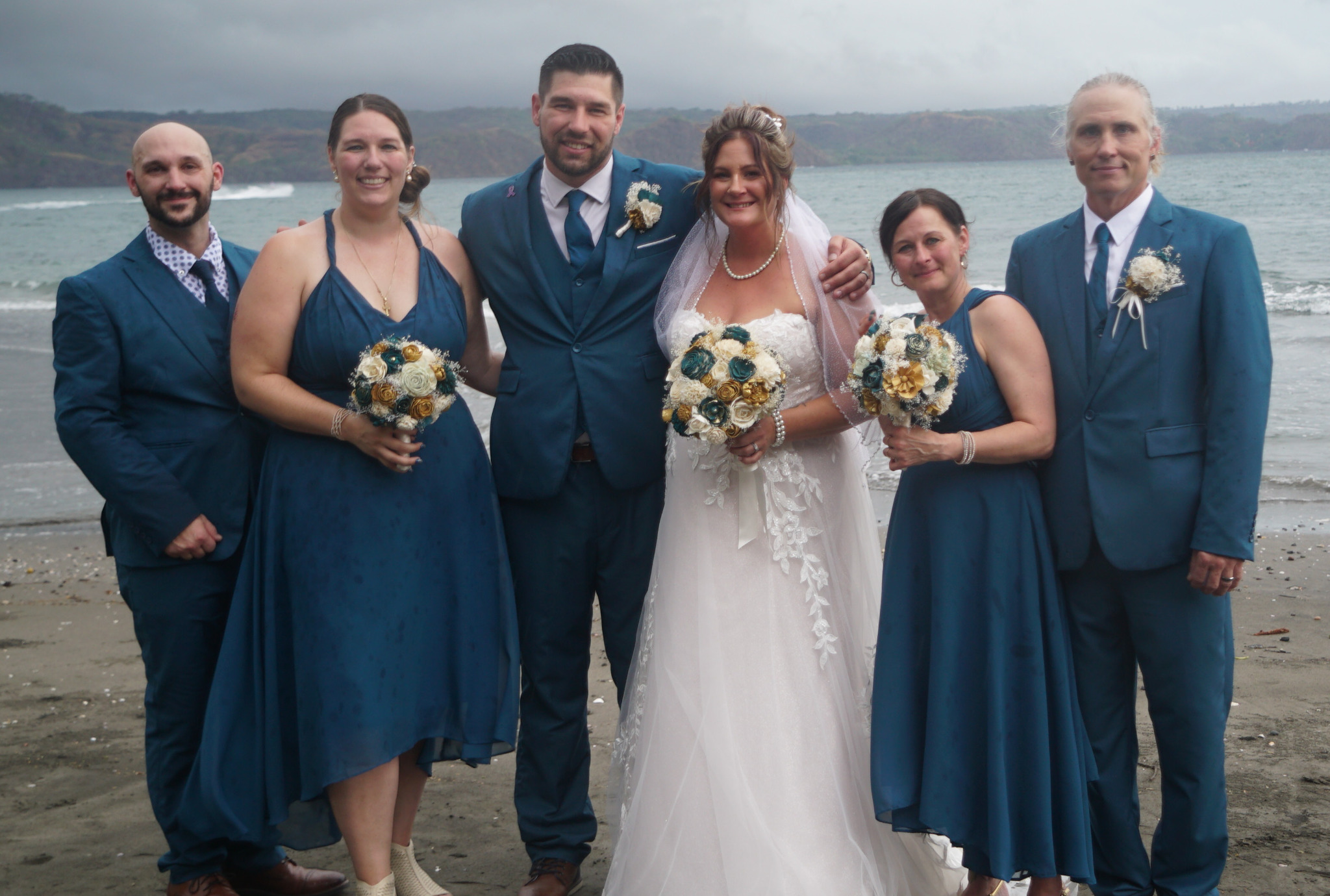 Wedding party portrait on the beach